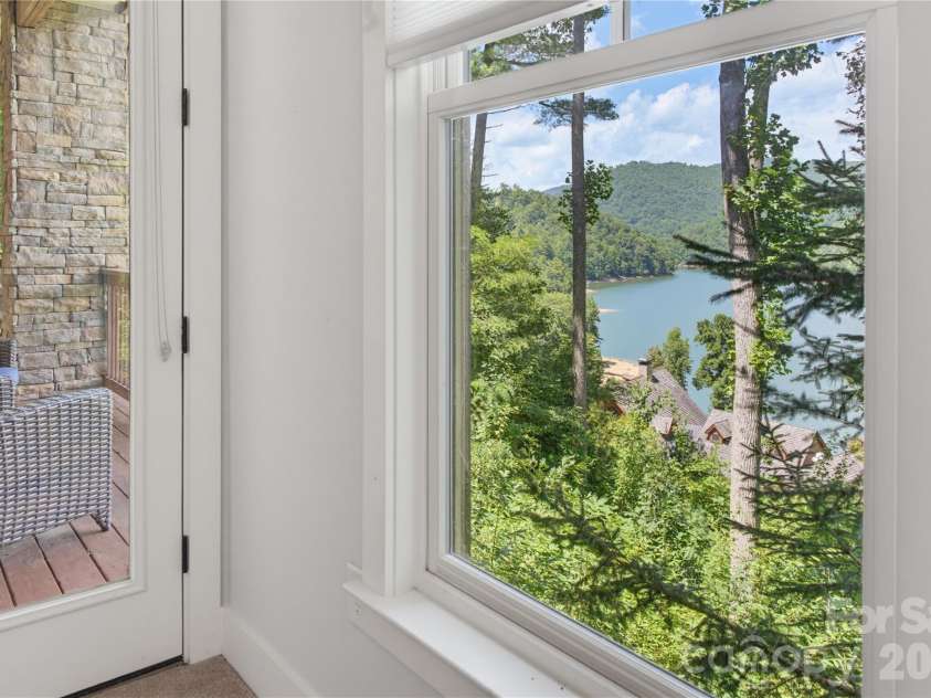 85 Southshore Drive, Tuckasegee, NC 28783.  MLS# CAR4226959, YatesRealty ID 6054. 