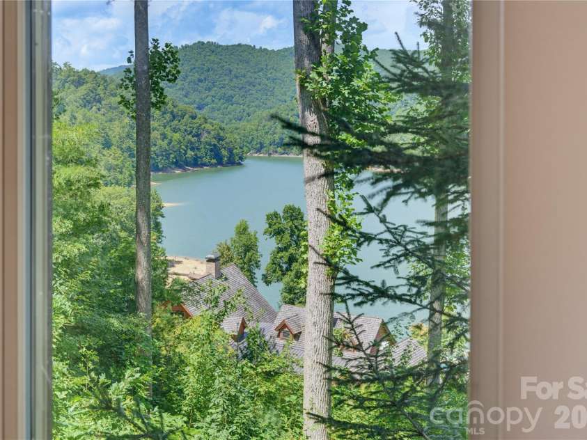 85 Southshore Drive, Tuckasegee, NC 28783.  MLS# CAR4226959, YatesRealty ID 6054. 