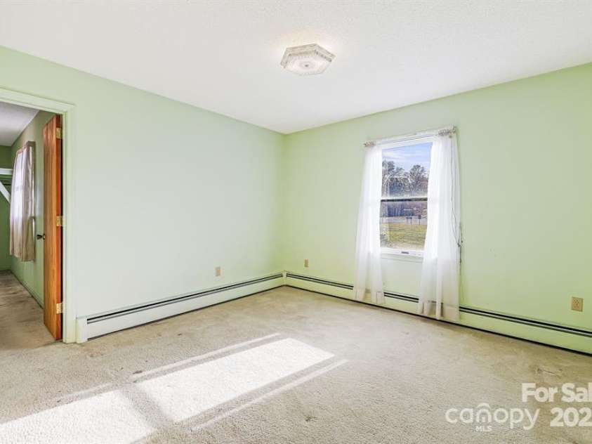 7 Brookshire Road, Leicester, NC 28748.  MLS# CAR4192771, YatesRealty ID 6055. 