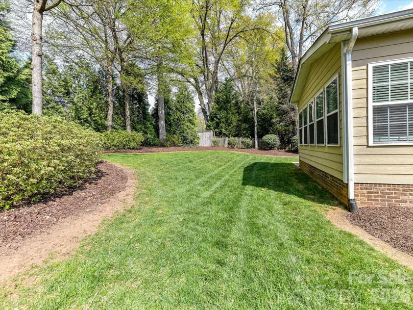 21277 Summerbrook Drive, Cornelius, NC 28031.  MLS# CAR4355875, YatesRealty ID 6062. Flat, easy to maintain backyard
