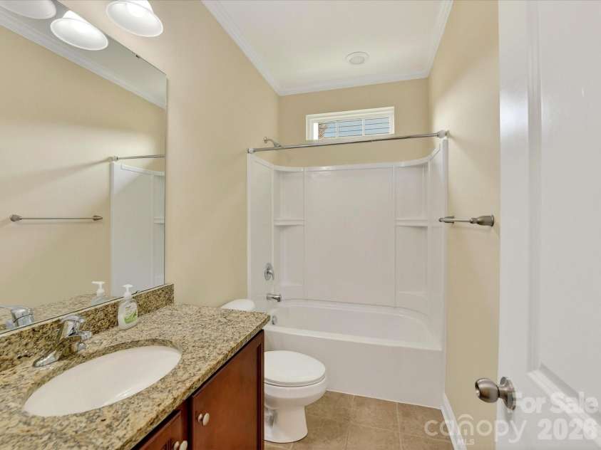 21277 Summerbrook Drive, Cornelius, NC 28031.  MLS# CAR4355875, YatesRealty ID 6062. Full bathroom with tub/shower