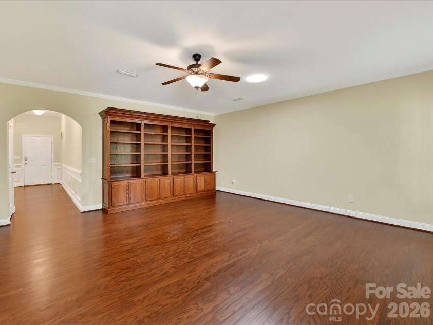 21277 Summerbrook Drive, Cornelius, NC 28031.  MLS# CAR4355875, YatesRealty ID 6062. Great Room has custom built-ins