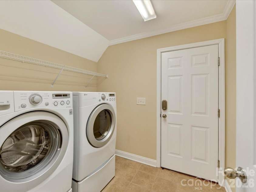 21277 Summerbrook Drive, Cornelius, NC 28031.  MLS# CAR4355875, YatesRealty ID 6062. Large laundry room on main level