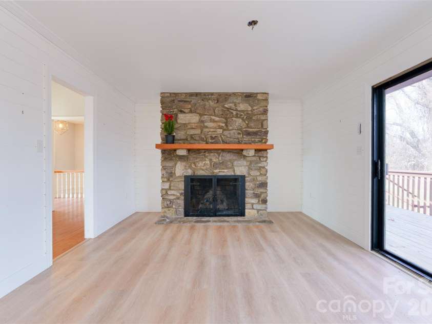 112 Hy Vu Drive, Canton, NC 28716.  MLS# CAR4324518, YatesRealty ID 6071. Fireplace in kitchen