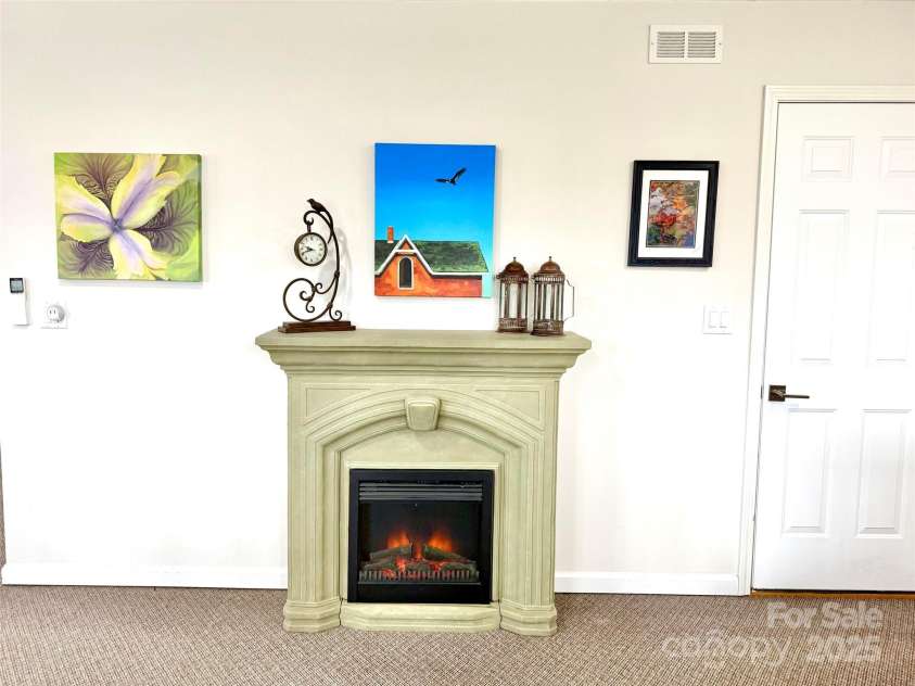 150 Hobby Horse Lane, Hendersonville, NC 28792.  MLS# CAR4241391, YatesRealty ID 6072. Electric Fireplace