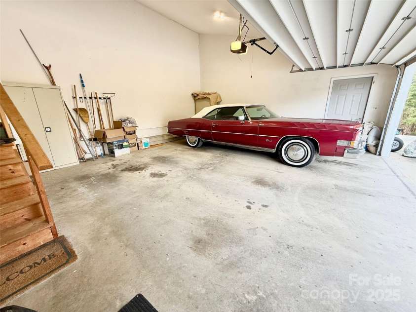 150 Hobby Horse Lane, Hendersonville, NC 28792.  MLS# CAR4241391, YatesRealty ID 6072. Main Level Garage