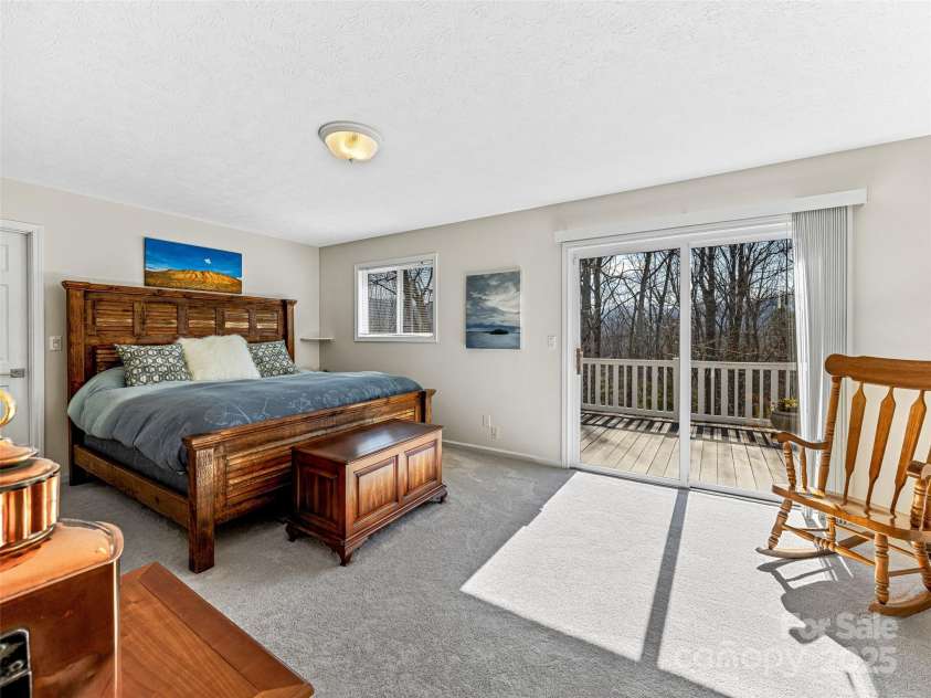 150 Hobby Horse Lane, Hendersonville, NC 28792.  MLS# CAR4241391, YatesRealty ID 6072. Primary Bedroom 18'11 x 11'10
