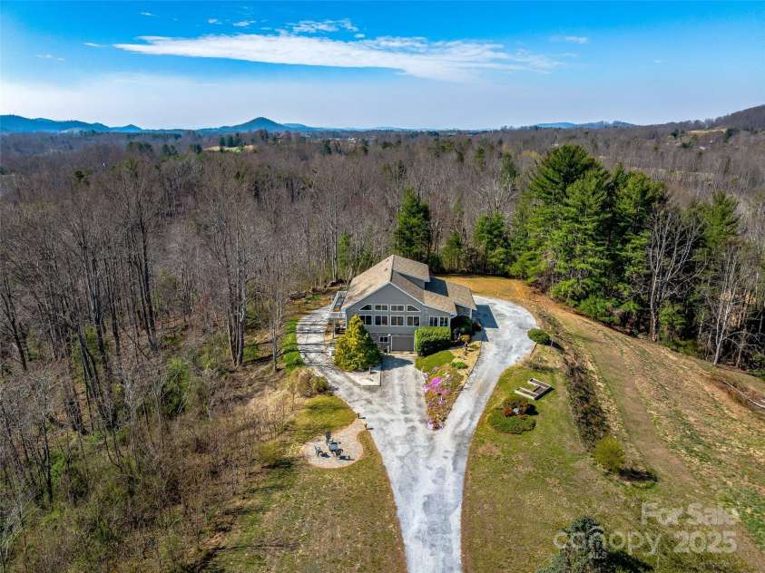 150 Hobby Horse Lane, Hendersonville, NC 28792.  MLS# CAR4241391, YatesRealty ID 6072. Private setting