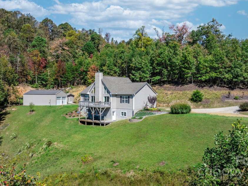 6833 Burkemont Road, Morganton, NC 28655.  MLS# CAR4189958, YatesRealty ID 6073. Complete privacy...so quiet and serene!! Spring at the bottom of the yard and a spring head further back with a holding tank. Not being used but is in place.