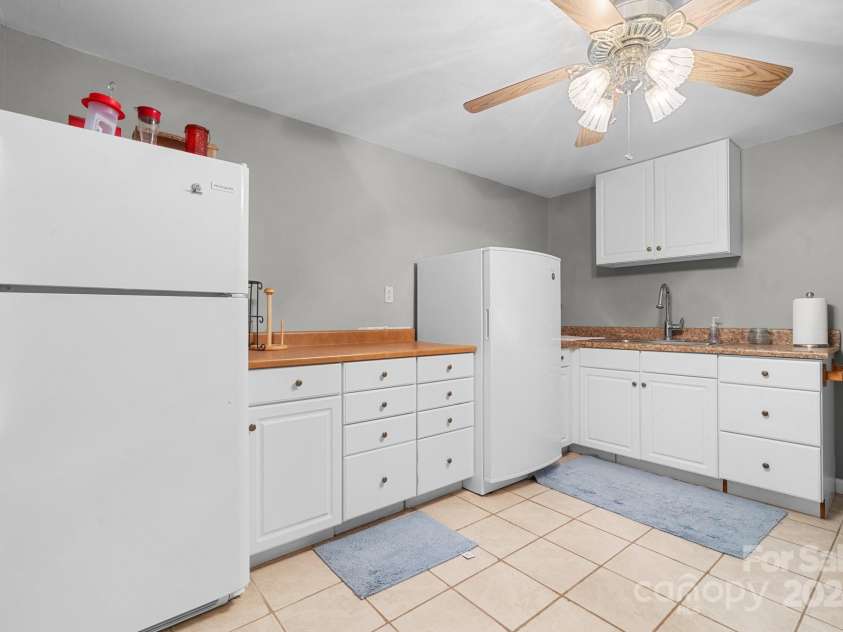 6833 Burkemont Road, Morganton, NC 28655.  MLS# CAR4189958, YatesRealty ID 6073. Kitchenette ...appliances do not convey in basement