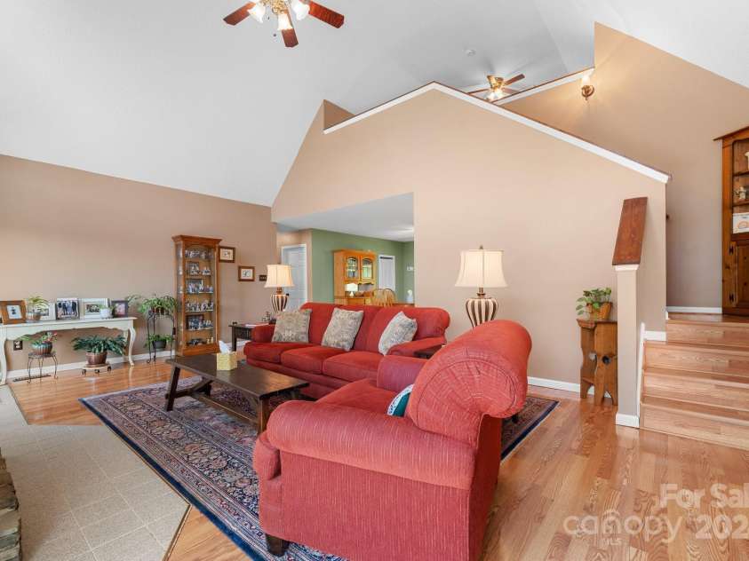 6833 Burkemont Road, Morganton, NC 28655.  MLS# CAR4189958, YatesRealty ID 6073. Living Room and stairway to loft