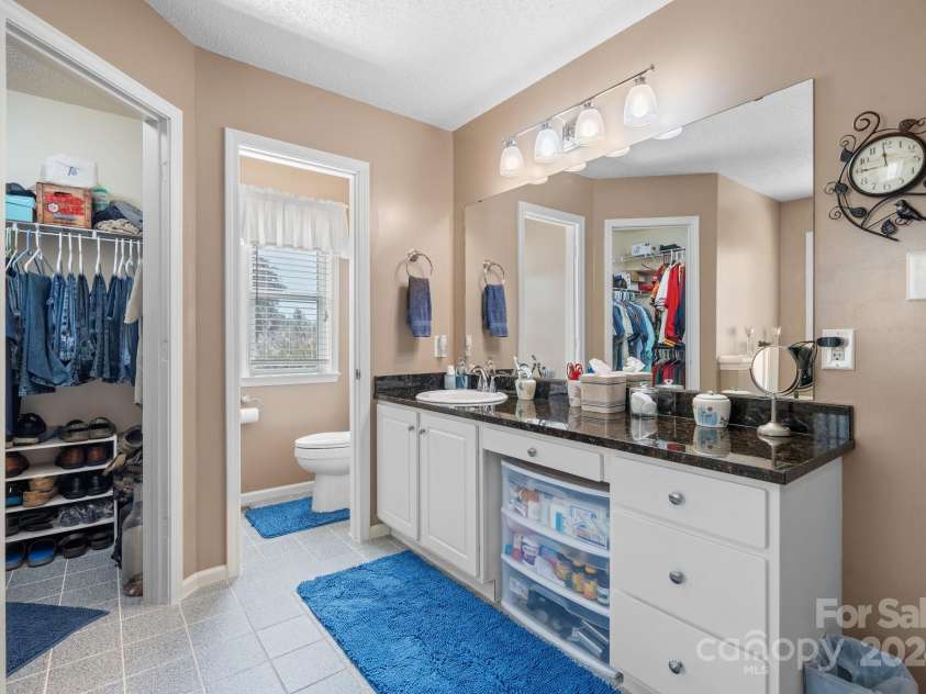 6833 Burkemont Road, Morganton, NC 28655.  MLS# CAR4189958, YatesRealty ID 6073. Water closet and stand up shower.