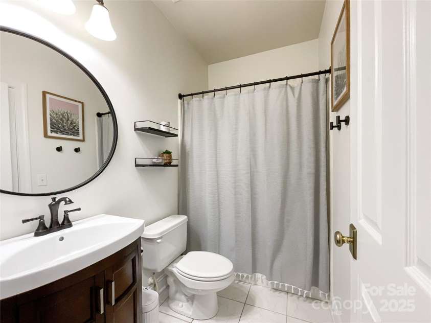 6114 Abergele Lane, Matthews, NC 28104.  MLS# CAR4241561, YatesRealty ID 6074. Full Bathroom on main Level
