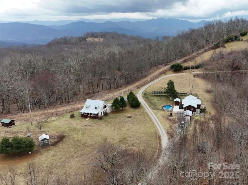 672/715 Windswept Ridge Road, Canton, NC 28716.  MLS# CAR4229345, YatesRealty ID 6077. Aerial View front and side facing of complete property
