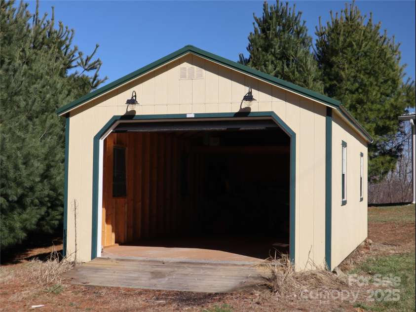 672/715 Windswept Ridge Road, Canton, NC 28716.  MLS# CAR4229345, YatesRealty ID 6077. Detached garage at House #2. Pull down garage door.
