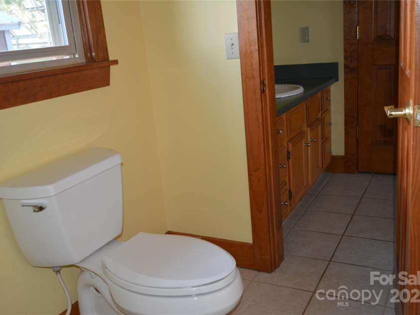 672/715 Windswept Ridge Road, Canton, NC 28716.  MLS# CAR4229345, YatesRealty ID 6077. House #1 - Bedroom 1 full bath ensuite