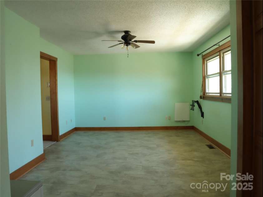 672/715 Windswept Ridge Road, Canton, NC 28716.  MLS# CAR4229345, YatesRealty ID 6077. House #1 Bedroom 1 with full bath ensuite. Split bedroom plan.