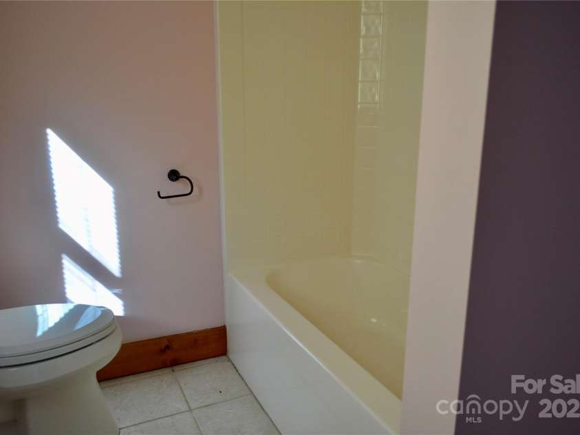 672/715 Windswept Ridge Road, Canton, NC 28716.  MLS# CAR4229345, YatesRealty ID 6077. House #1 - Full bath in the basement bedroom.