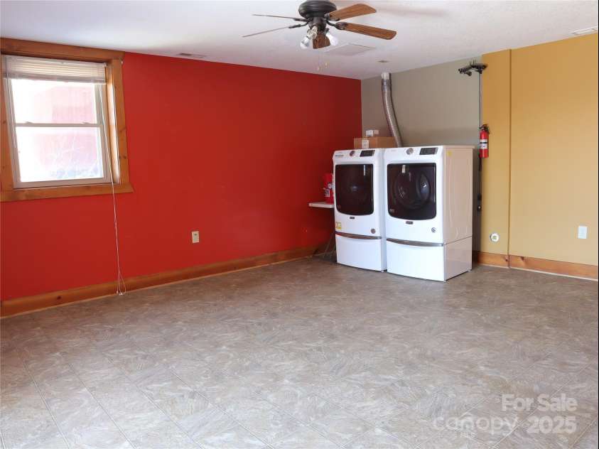 672/715 Windswept Ridge Road, Canton, NC 28716.  MLS# CAR4229345, YatesRealty ID 6077. House #1 - Large Laundry/storage area that has access to outside patio. Located in basement.