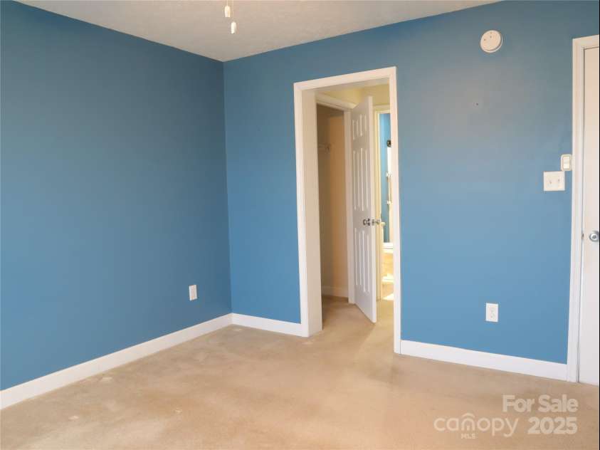 672/715 Windswept Ridge Road, Canton, NC 28716.  MLS# CAR4229345, YatesRealty ID 6077. House #2 Master bedroom.