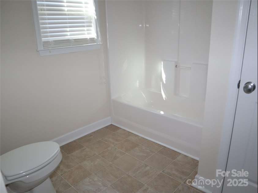 672/715 Windswept Ridge Road, Canton, NC 28716.  MLS# CAR4229345, YatesRealty ID 6077. House #2 upstairs full bath.