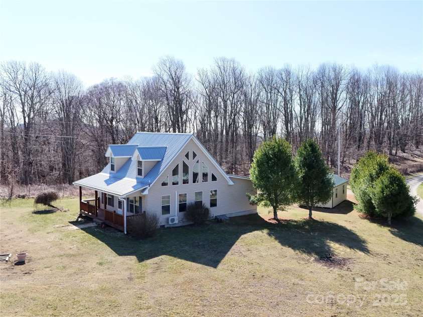 672/715 Windswept Ridge Road, Canton, NC 28716.  MLS# CAR4229345, YatesRealty ID 6077. House #2 - with large front porch, detached garage, gazebo and greenhouse.