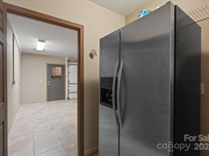 29 Down To Earth Drive, Burnsville, NC 28714.  MLS# CAR4217184, YatesRealty ID 608. Basement