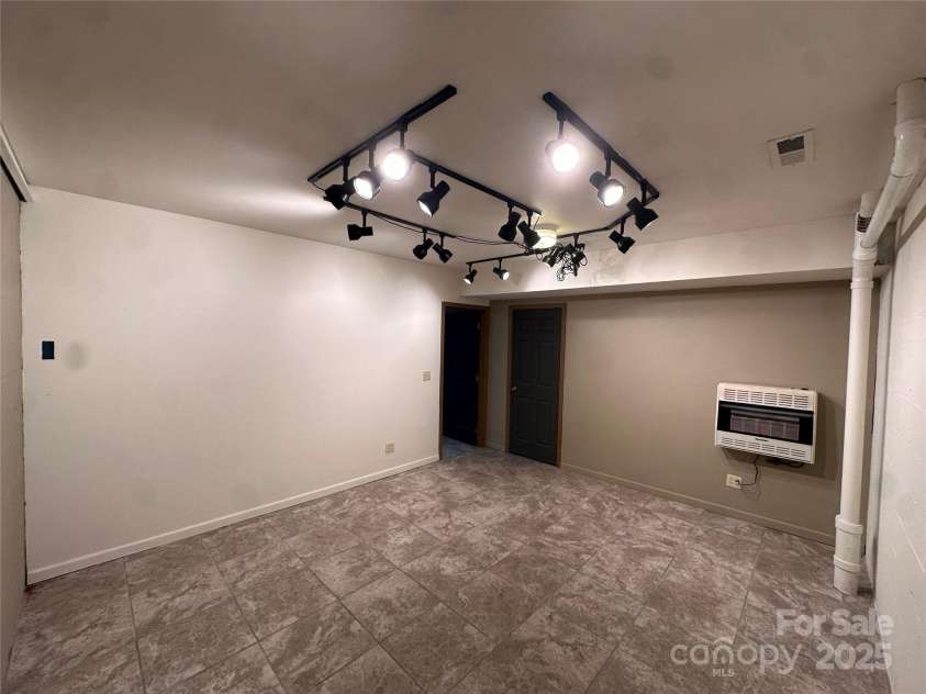 29 Down To Earth Drive, Burnsville, NC 28714.  MLS# CAR4217184, YatesRealty ID 608. Basement Room