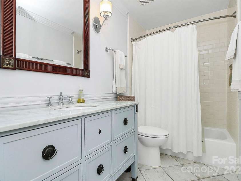 200 Port Royal Drive, Matthews, NC 28105.  MLS# CAR4245181, YatesRealty ID 6086. Hall bathroom