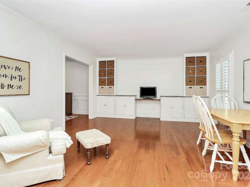 200 Port Royal Drive, Matthews, NC 28105.  MLS# CAR4245181, YatesRealty ID 6086. Living room w/built-ins.