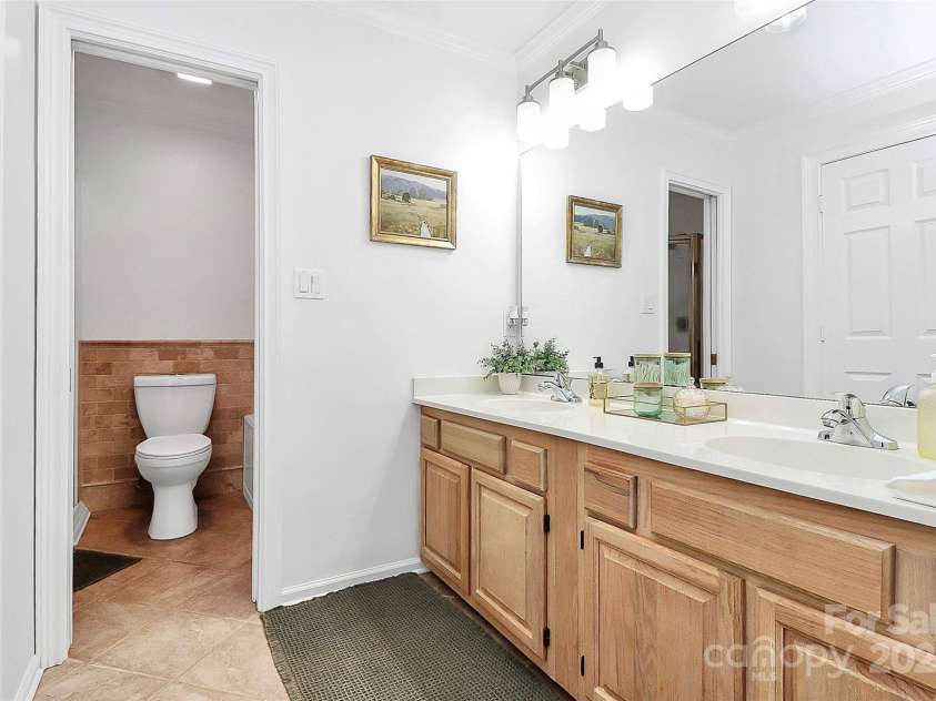 200 Port Royal Drive, Matthews, NC 28105.  MLS# CAR4245181, YatesRealty ID 6086. Primary bath