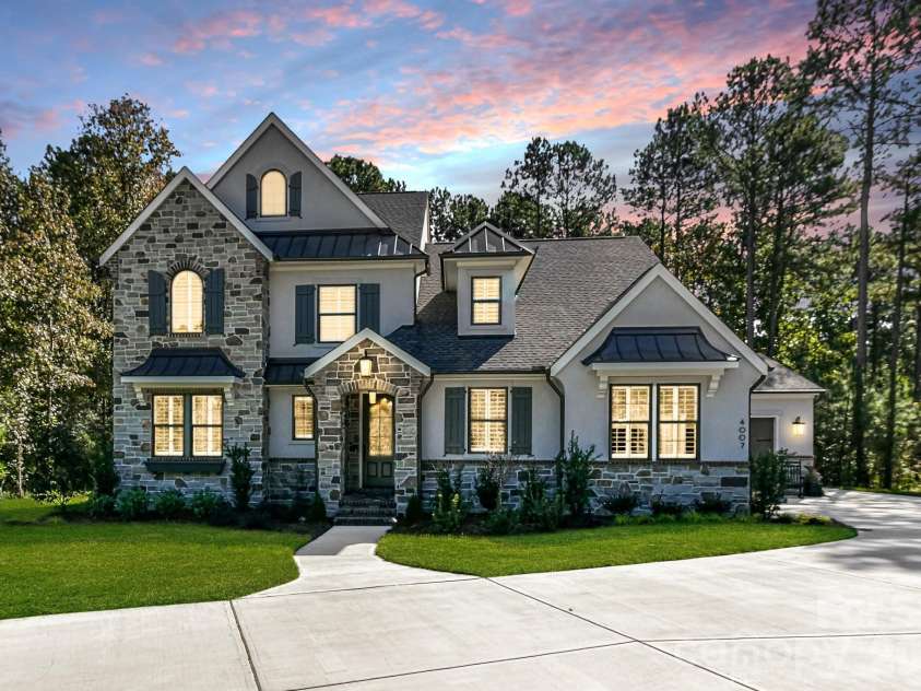 305 Weddington Grove Lane, Weddington, NC 28104.  MLS# CAR4298467, YatesRealty ID 6087. Timeless stone and stucco exterior!