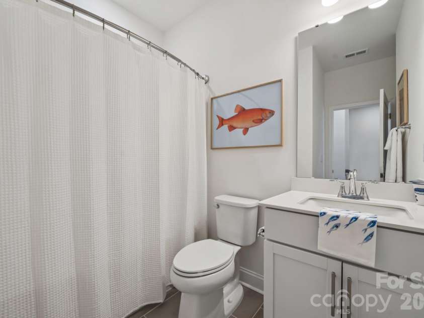 4148 Alexander View Drive, Charlotte, NC 28226.  MLS# CAR4345883, YatesRealty ID 6089. Guest bath for bedrooms 2 and 3
