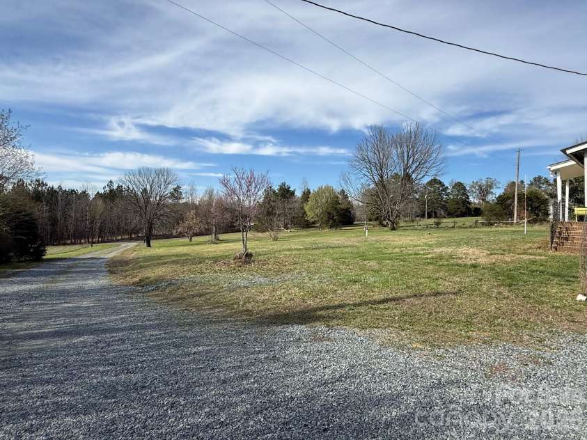 6875 Mount Pleasant Road, Concord, NC 28025.  MLS# CAR4361552, YatesRealty ID 6090. Large flat yard space