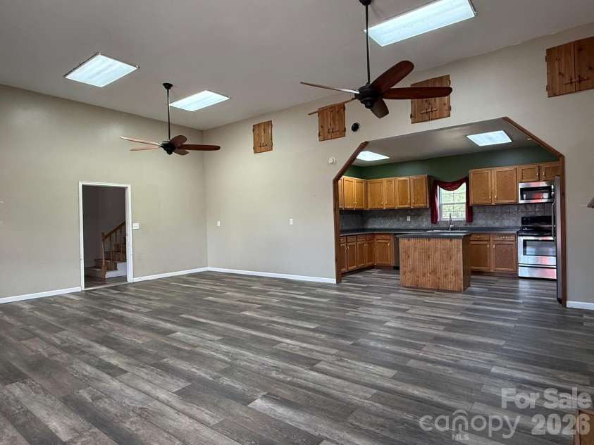 6875 Mount Pleasant Road, Concord, NC 28025.  MLS# CAR4361552, YatesRealty ID 6090. Primary living area converted from original garage (unpermitted).