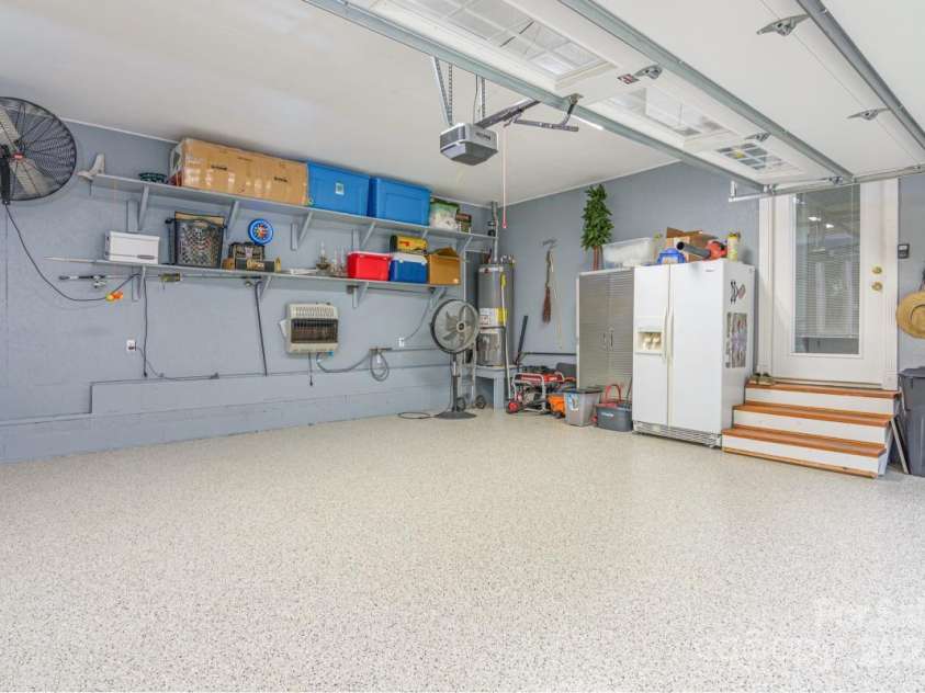 231 Kimberly Ann Drive, Hendersonville, NC 28792.  MLS# CAR4285461, YatesRealty ID 6092. Heated garage, pristine epoxy floor