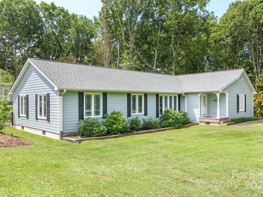 231 Kimberly Ann Drive, Hendersonville, NC 28792.  MLS# CAR4285461, YatesRealty ID 6092. Large front yard, fully fenced back yard