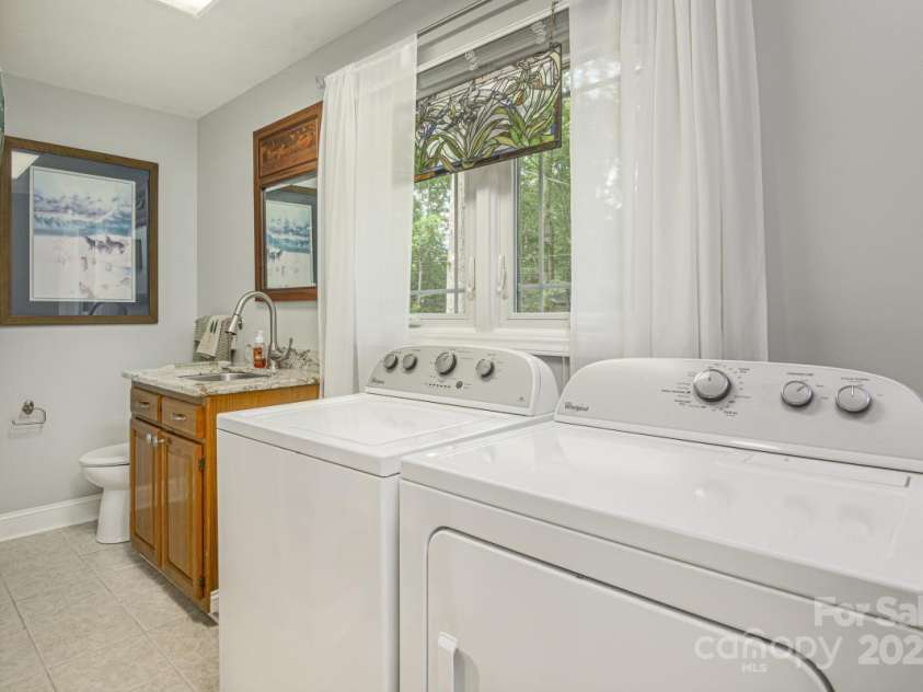 231 Kimberly Ann Drive, Hendersonville, NC 28792.  MLS# CAR4285461, YatesRealty ID 6092. Laundry