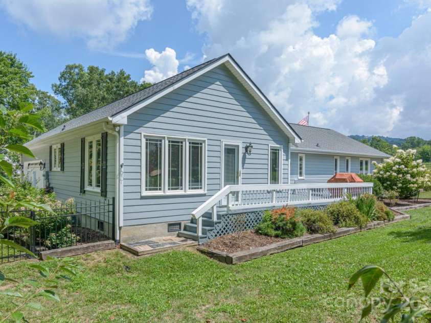 231 Kimberly Ann Drive, Hendersonville, NC 28792.  MLS# CAR4285461, YatesRealty ID 6092. View of home from back yard