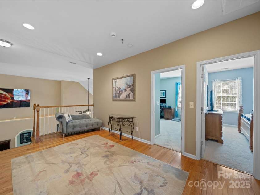 9727 Glenburn Lane, Charlotte, NC 28278.  MLS# CAR4240840, YatesRealty ID 6096. Loft with gleaming gwood floors