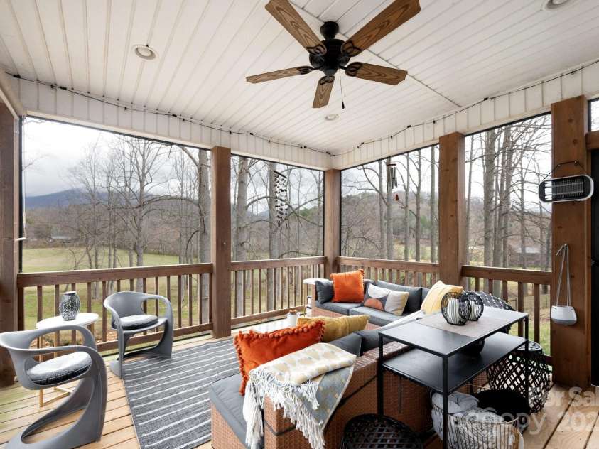 155 Parker Road, Asheville, NC 28805.  MLS# CAR4233111, YatesRealty ID 6104. Screened Back Porch
