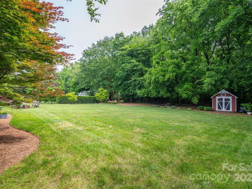 133 Castaway Trail, Mooresville, NC 28117.  MLS# CAR4216721, YatesRealty ID 6111. Back yard view from deck