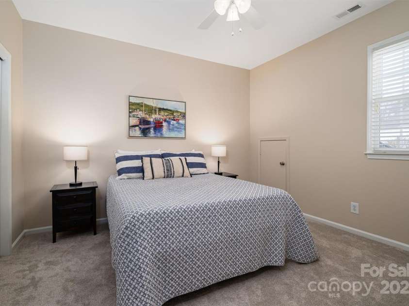 133 Castaway Trail, Mooresville, NC 28117.  MLS# CAR4216721, YatesRealty ID 6111. Bedroom 2 w/closet & floored storage attchd