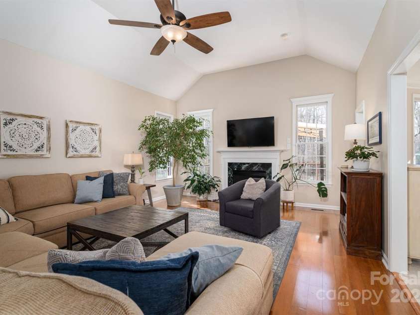 133 Castaway Trail, Mooresville, NC 28117.  MLS# CAR4216721, YatesRealty ID 6111. Great room with gas fireplace, tall ceilings