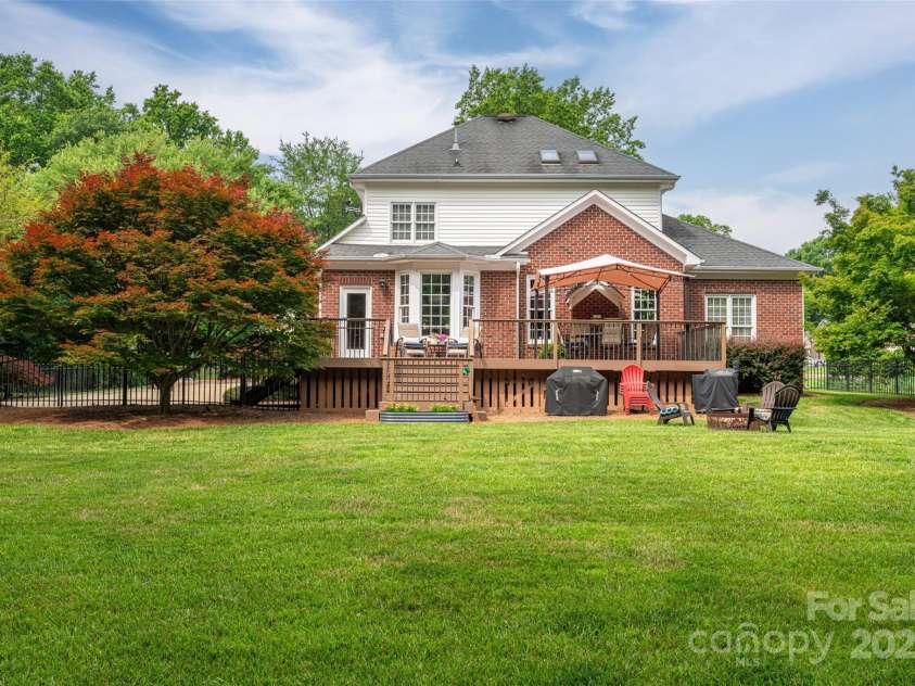 133 Castaway Trail, Mooresville, NC 28117.  MLS# CAR4216721, YatesRealty ID 6111. Middle of yard to back of home