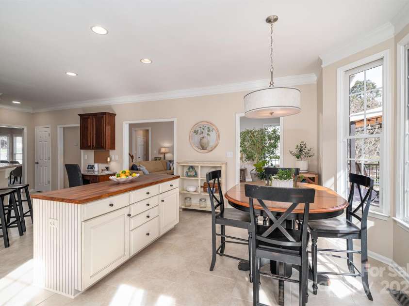 133 Castaway Trail, Mooresville, NC 28117.  MLS# CAR4216721, YatesRealty ID 6111. Second island and dining area
