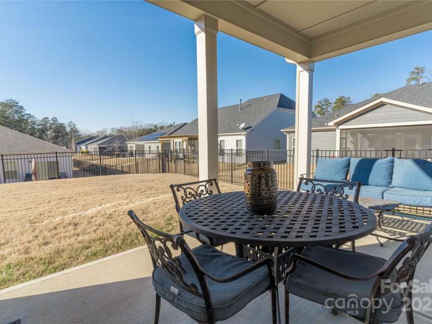 15035 Batteliere Drive, Charlotte, NC 28278.  MLS# CAR4228865, YatesRealty ID 6114. Inviting covered back porch.