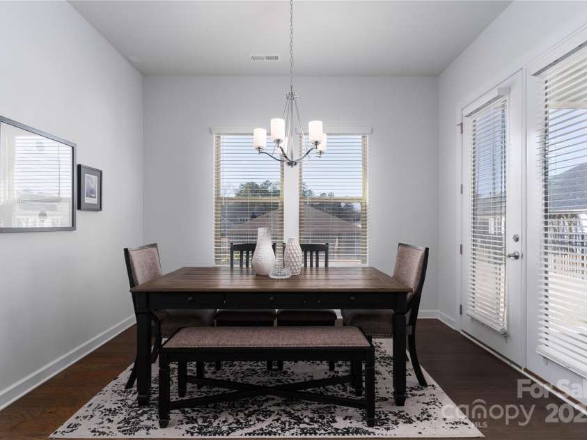 15035 Batteliere Drive, Charlotte, NC 28278.  MLS# CAR4228865, YatesRealty ID 6114. Let the sunshine in your dining area that is next to the covered patio.