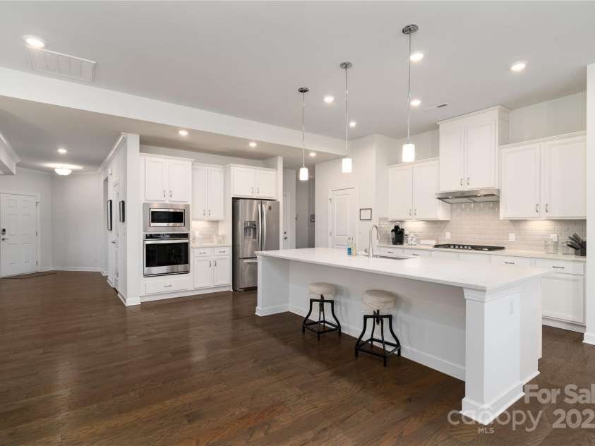 15035 Batteliere Drive, Charlotte, NC 28278.  MLS# CAR4228865, YatesRealty ID 6114. White kitchens never go out of style.