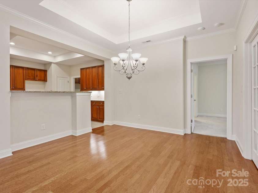 1910 Mezzo Court, Matthews, NC 28105.  MLS# CAR4245911, YatesRealty ID 6115. Dining and Breakfast bar area